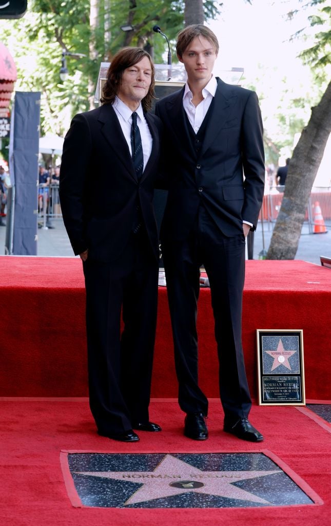 Mingus Reedus (right) pictured with his Walking Dead star father Norman Reedus in 2022, was arrested in Manhattan on August 23 for assault, police said