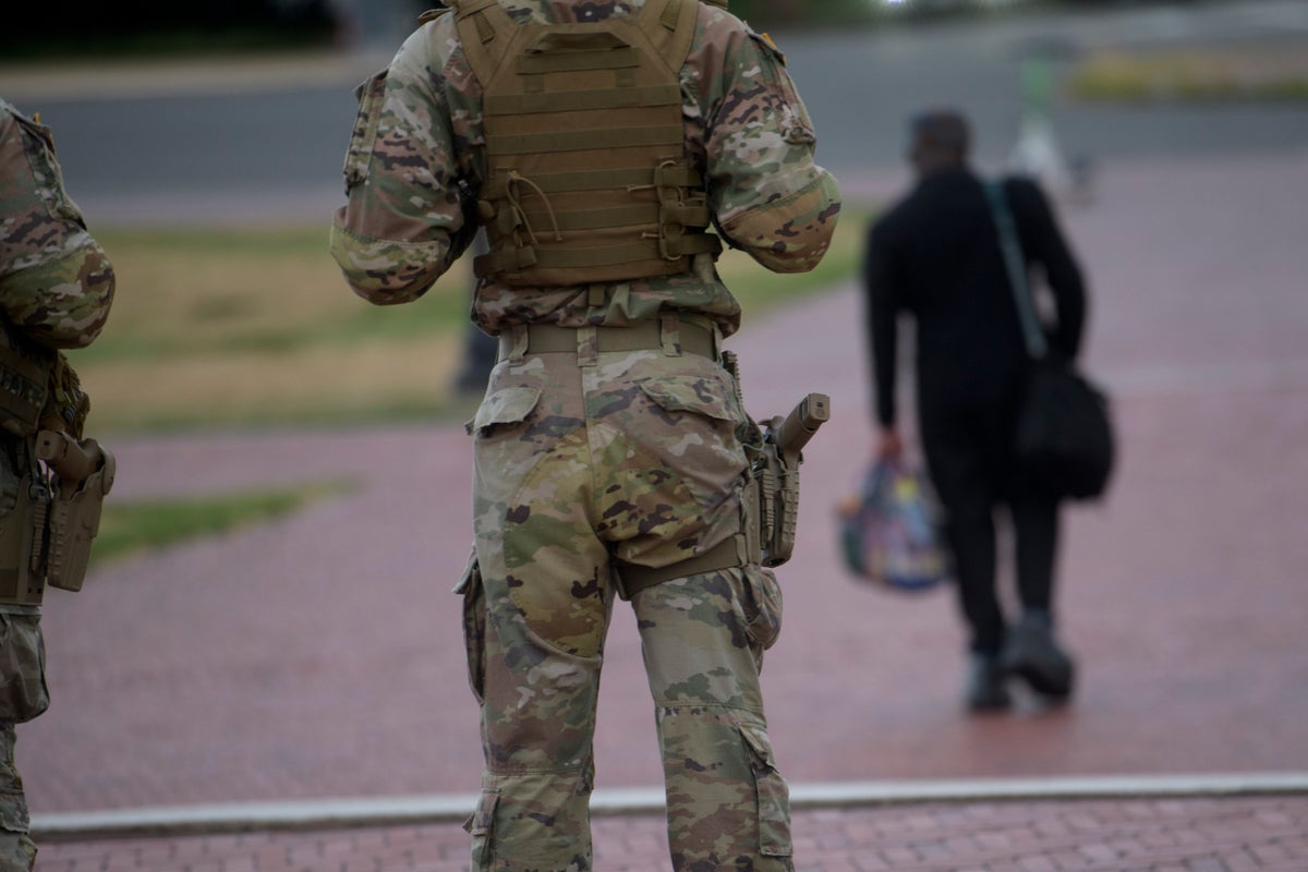National Guard now carrying pistols in Washington as troops enter third week deployed to capital National Guard now carrying pistols in Washington as troops enter third week deployed to capital