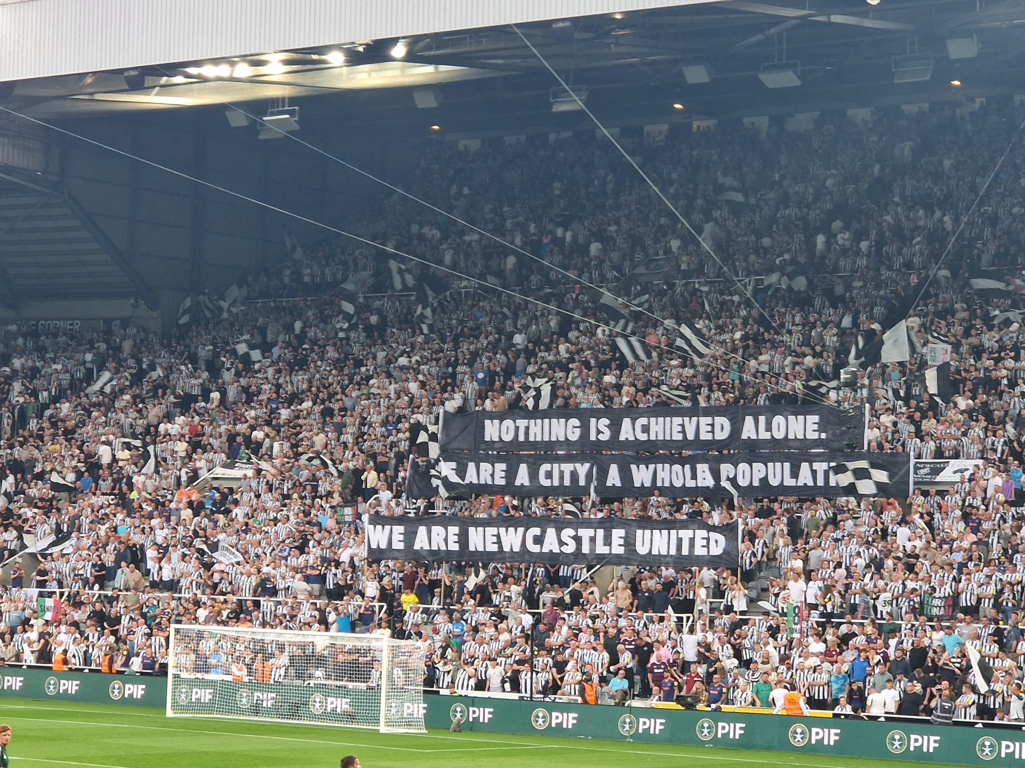 Newcastle fans unfurl a banner in support of their club amid ongoing speculation over Alexander Isak