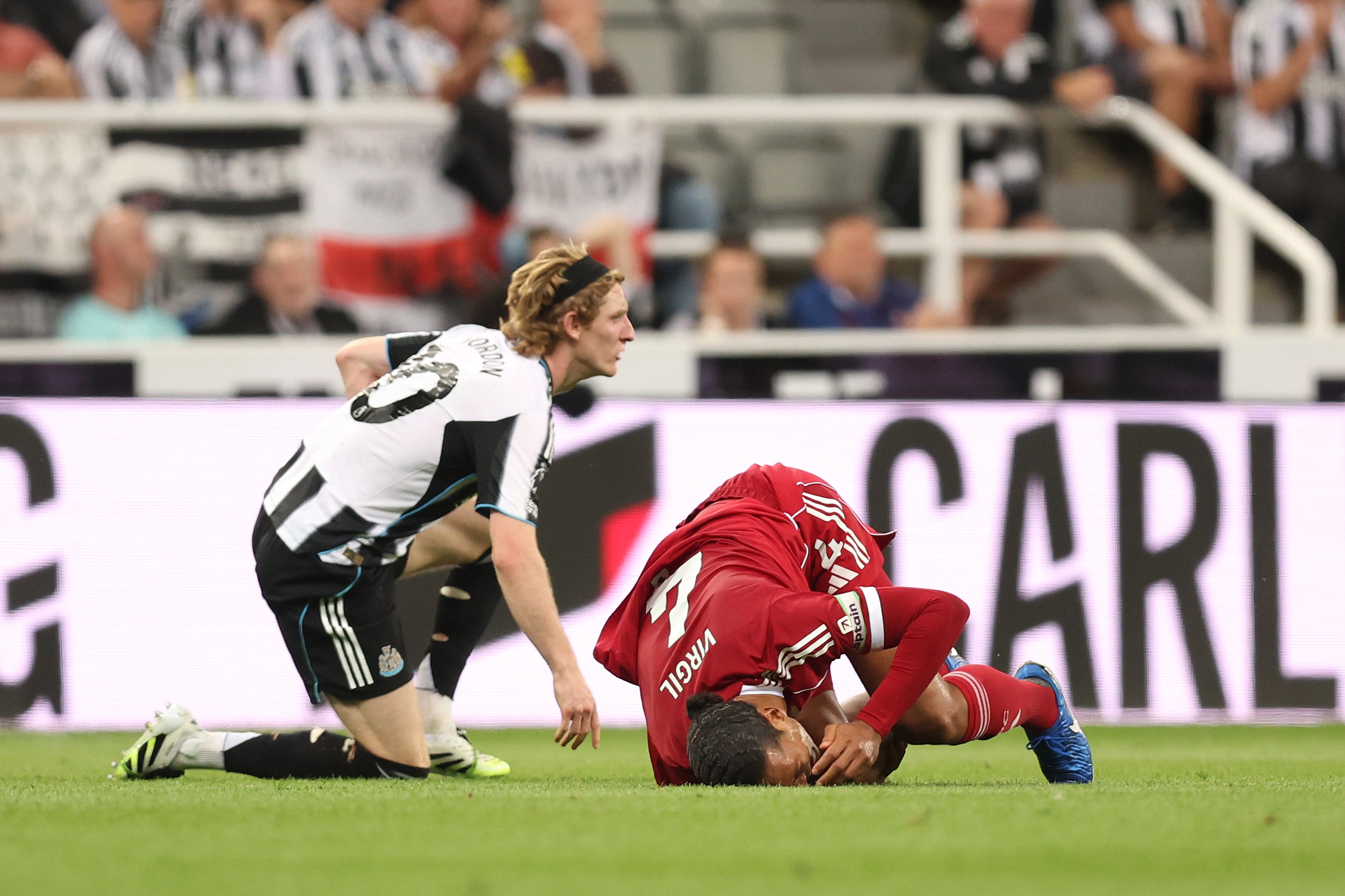 Gordon arrived late for a tackle on Virgil van Dijk