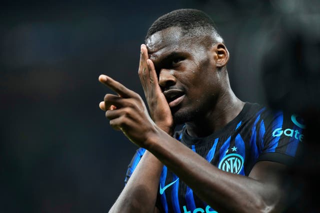 Debutant Ange-Yoan Bonny wrapped up victory for Inter (Luca Bruno/AP)