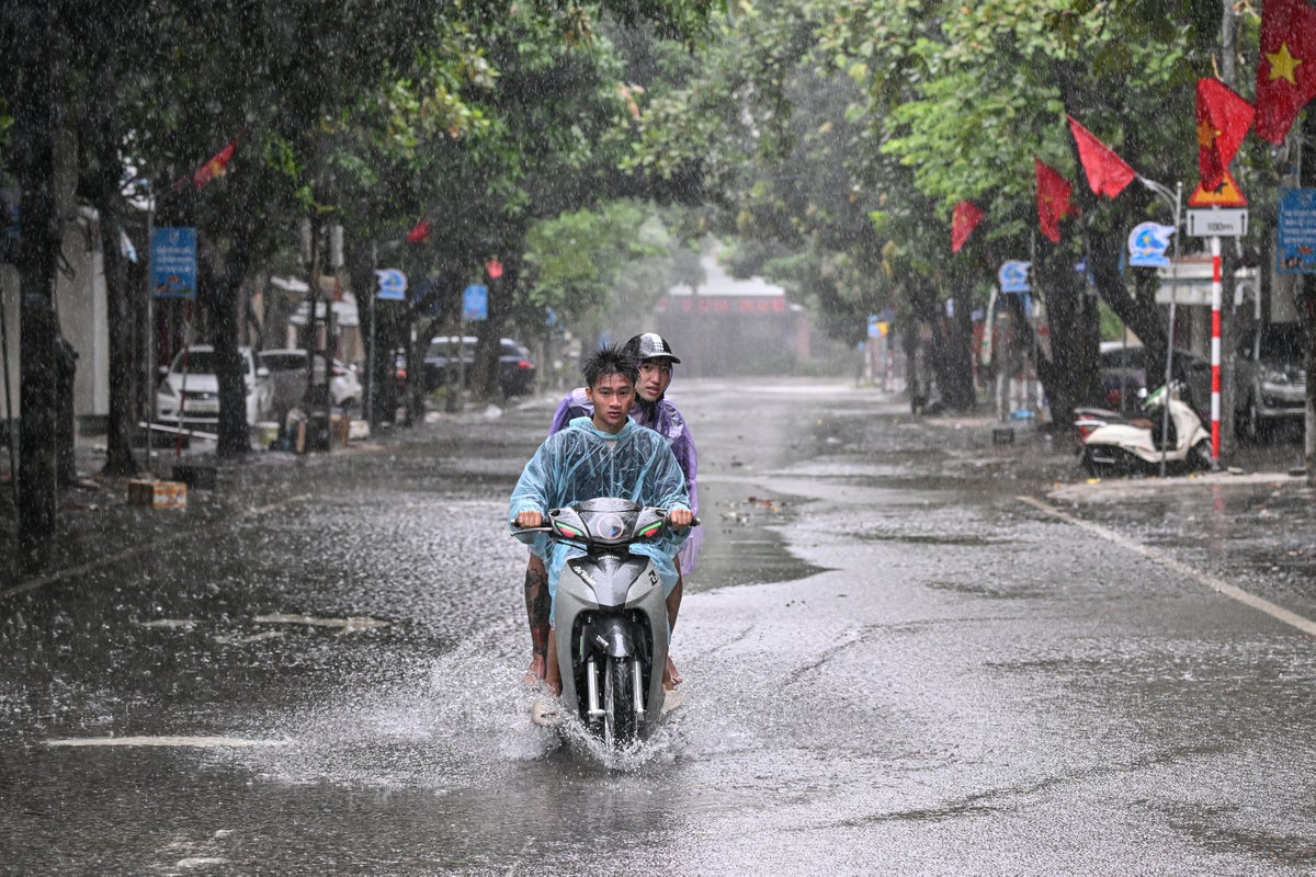 Vietnam closes schools and airports and evacuates thousands as it braces for Typhoon Kajiki
