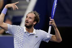 Daniil Medvedev has meltdown after photographer walks on court at US Open match point - before angrily smashing racket on ground