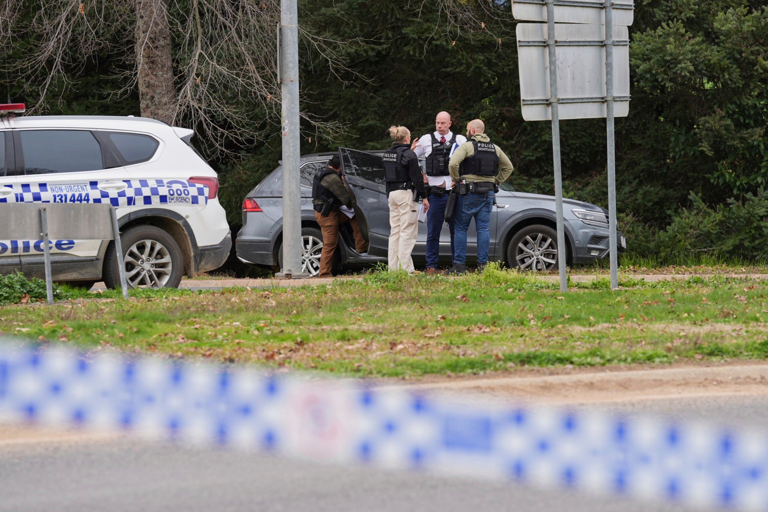 Police wait near the scene of a shooting in the high country of Porepunkah in the state of Victoria, Australia, Tuesday, 26 August 2025
