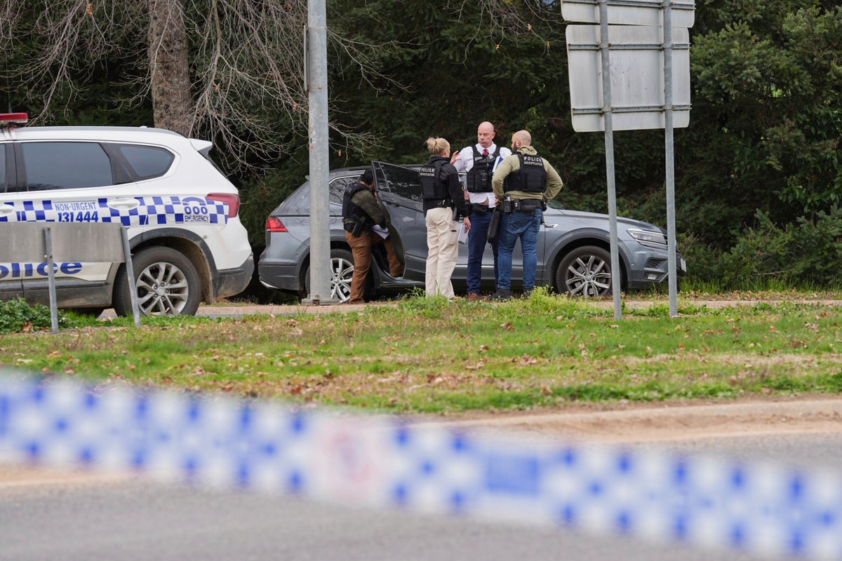 Two police officers killed, third injured while serving warrant
