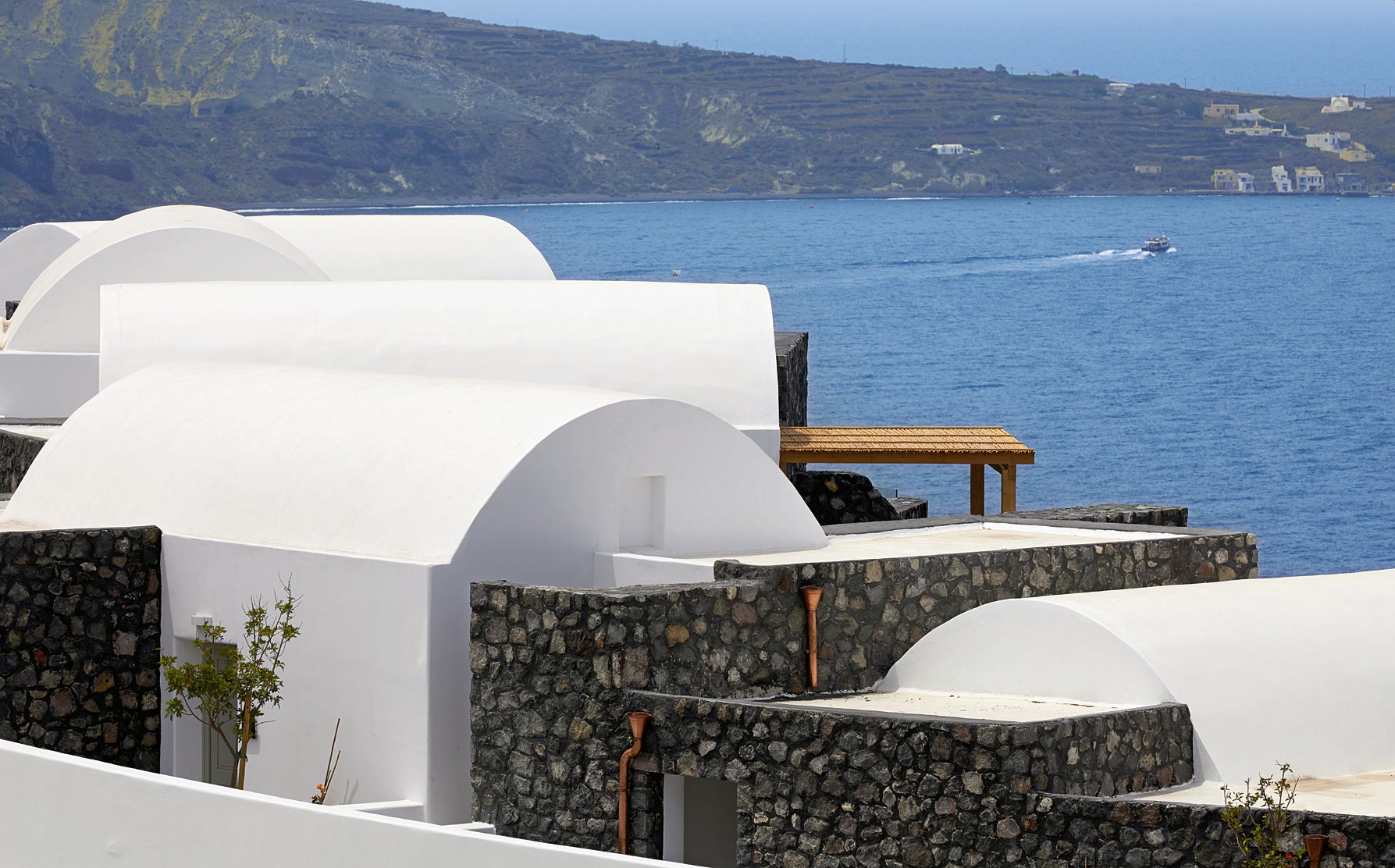 While the resort does not have a beach, suites still have a prime view over the sparkling Aegean