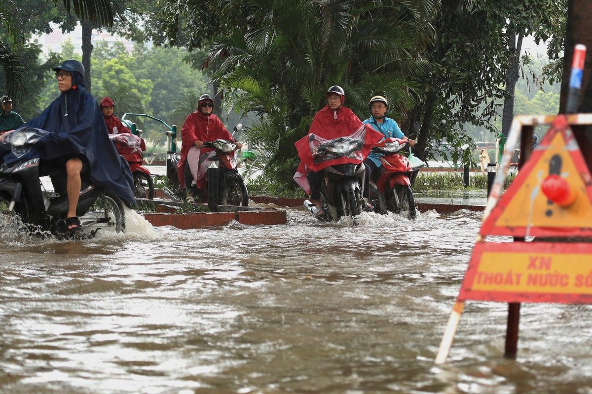 Three killed in Vietnam as Typhoon Kajiki brings floods and blackouts