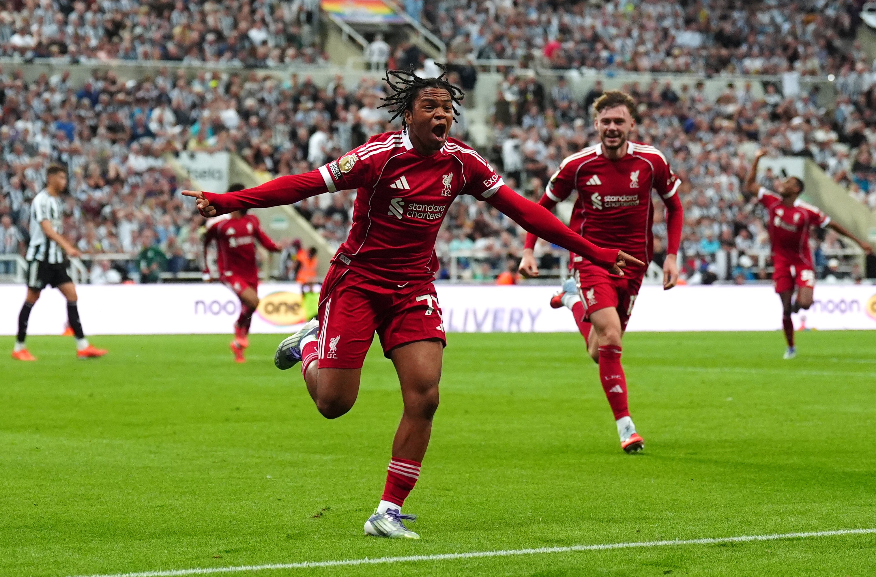Liverpool’s Rio Ngumoha wheels away after scoring a Premier League winner against Newcastle on his debut (Owen Humphreys/PA)
