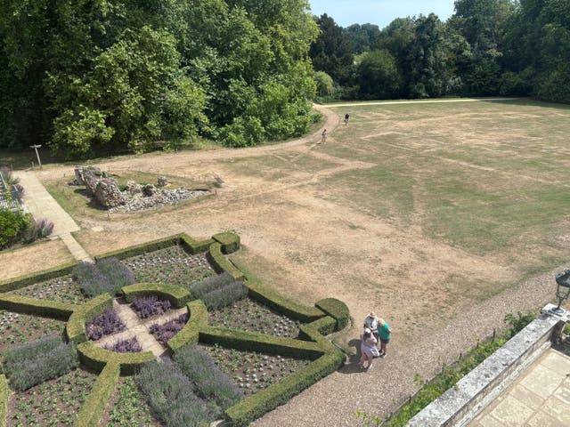 <p>Parch marks showing the traces of former monastery buildings have appeared at Mottisfont in Hampshire</p>