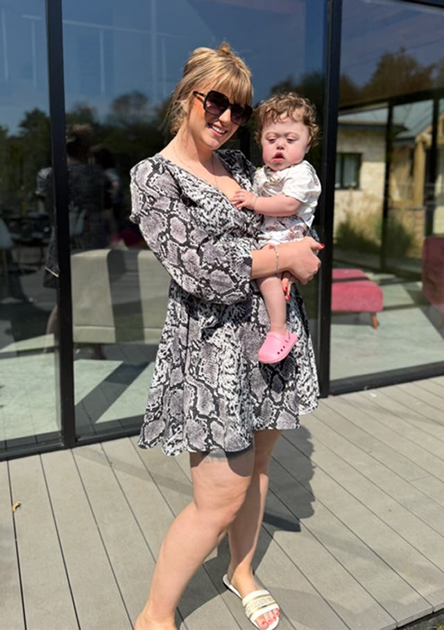 <p>Georgia Turner with her daughter Amelia who was born with a condition, congenital diaphragmatic hernia (CDH), which meant her stomach and bowel moved into her chest</p>