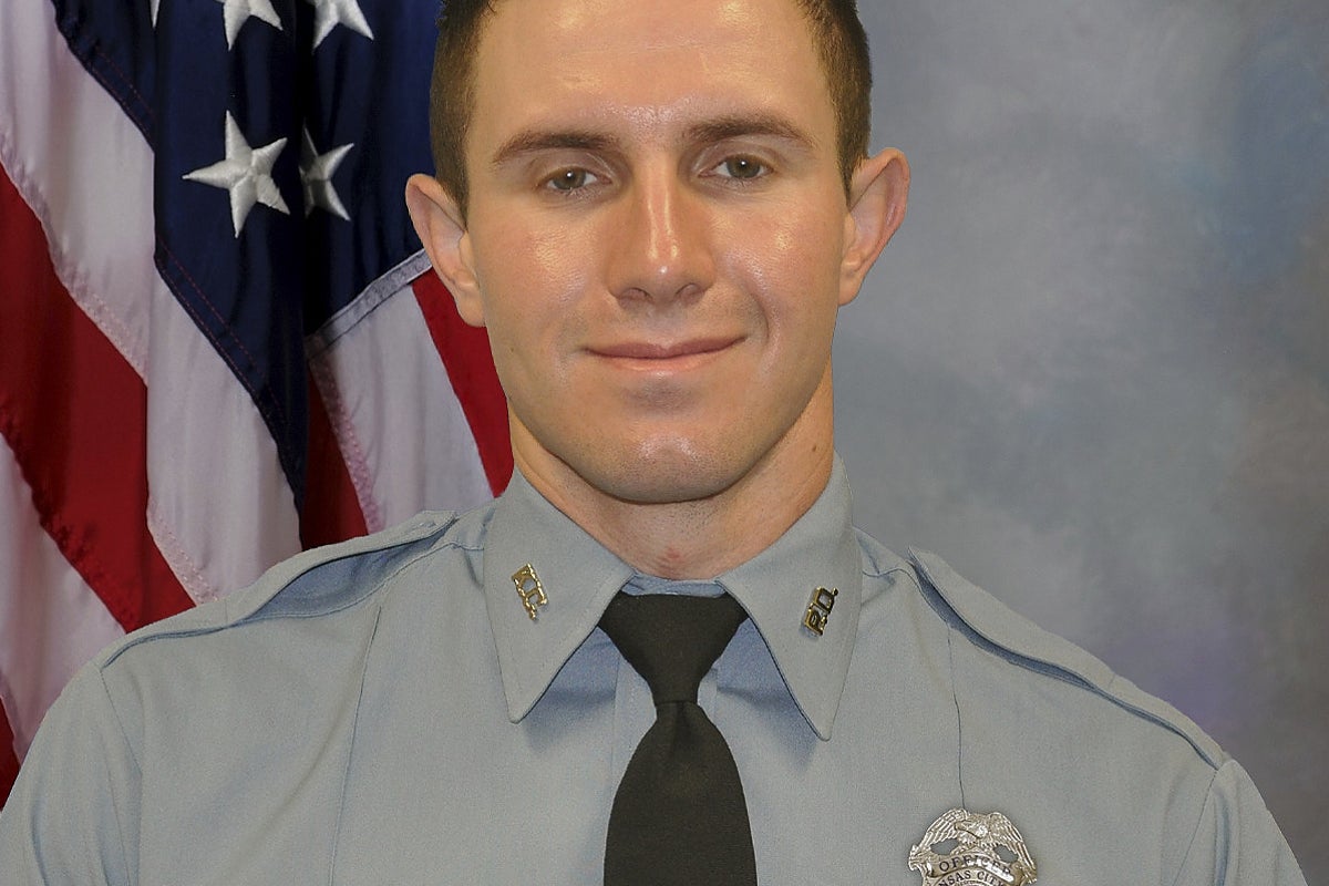 A Kansas City, Kansas, police officer has died after being struck by a fleeing driver
