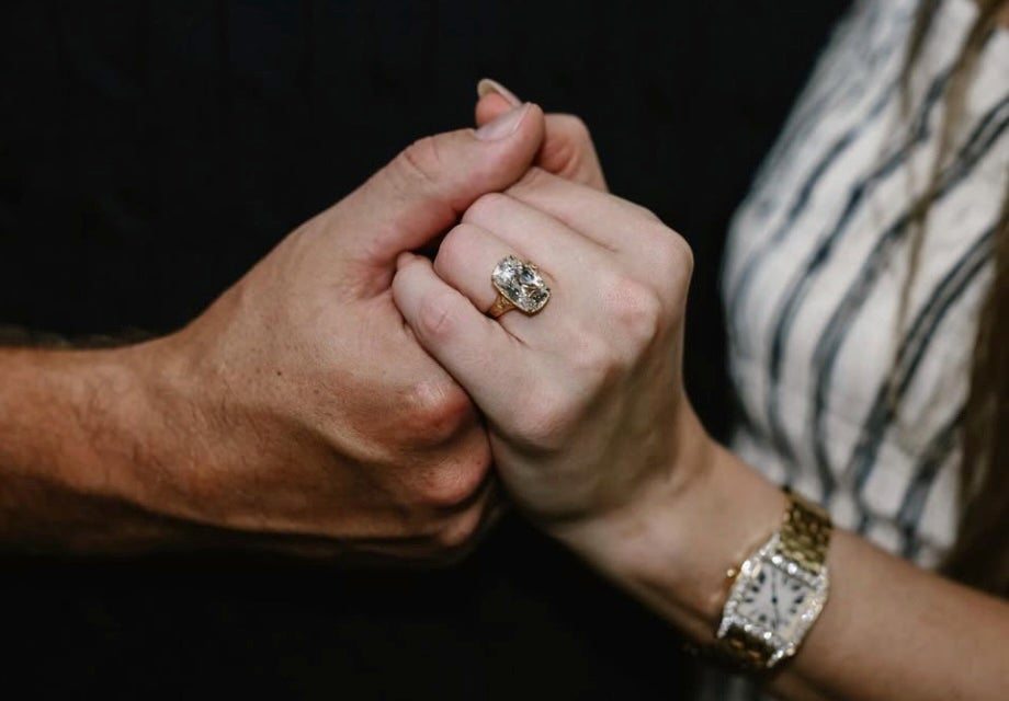 Swift shared photos of a stunning floral engagement shoot, including a close-up of her ‘ginormous’ ring, as one reporter put it