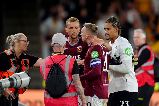 <p>Jarrod Bowen was pulled away from fans after an argument following West Ham’s cup defeat </p>