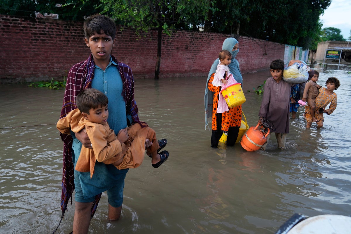 India warns Pakistan to expect flooding after opening major dams near the border