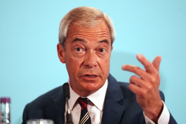 Nigel Farage said Reform was ‘not even discussing women and children’ as part of its deportation plans, a day after he said they would be detained if they arrived in the UK illegally (Andrew Milligan/PA)