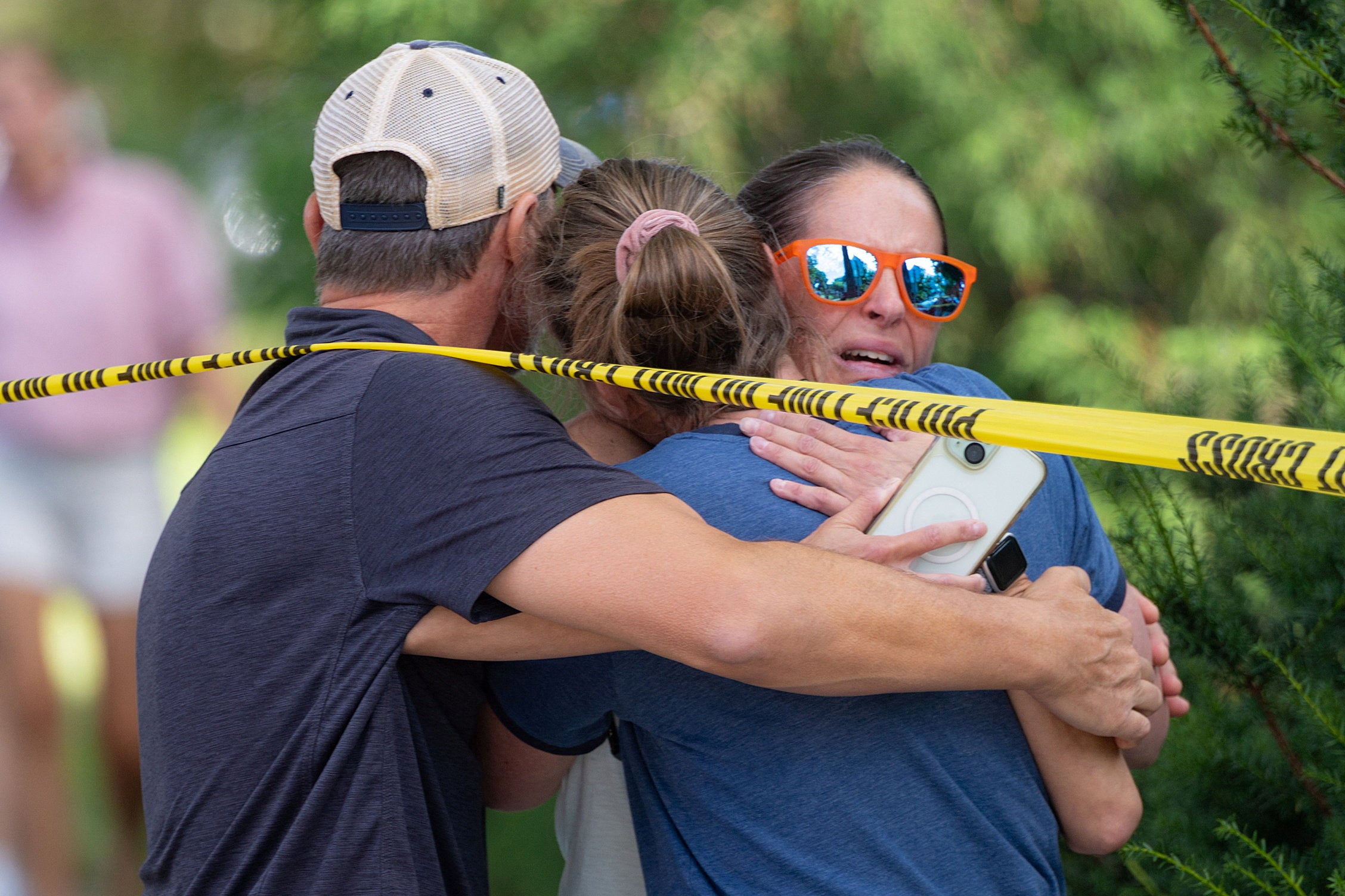 Two children died and 17 others have been injured after a gunman fired ‘dozens’ of rounds at a church in Minneapolis.