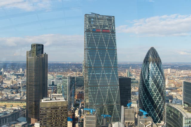 The FTSE 100 ended slightly lower on Wednesday (Dominic Lipkinski/PA)