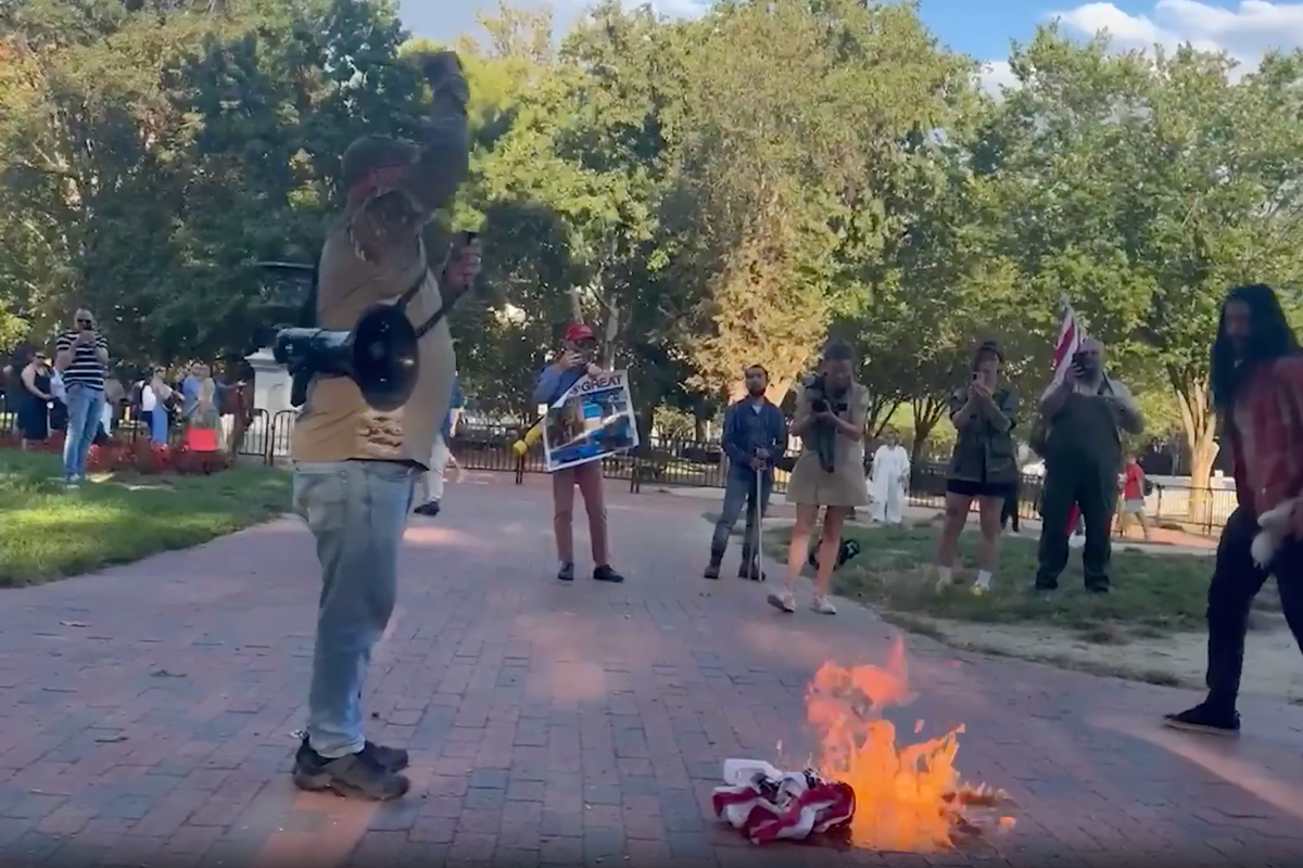 Military veteran detained after burning American flag in protest at Trump’s executive order