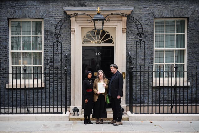 Representatives of the London Freelance NUJ branch outside Number 10. (Left to right) Mariam Elsayeh, Pennie Quinton, Mike Holderness (James Manning/PA)