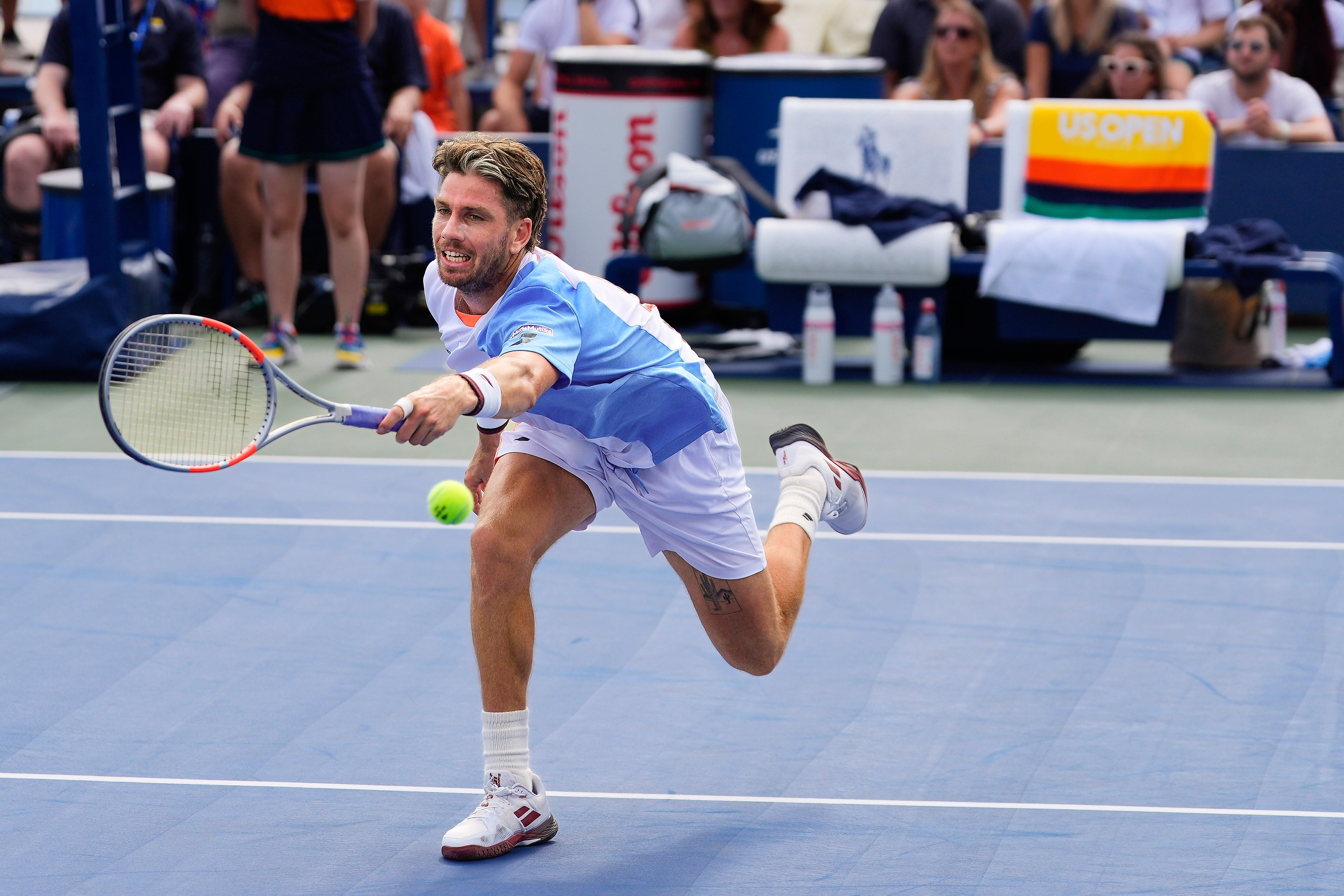 Cameron Norrie lunges for a forehand (Yuki Iwamura/AP)