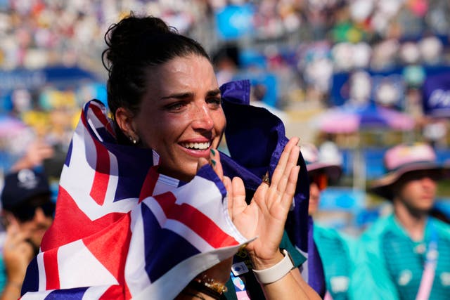 Jessica Fox celebrates her sister Noemie Fox of Australia winning a gold medal in the women’s kayak cross finals during the canoe slalom at the 2024 Summer Olympics (Ebrahim Noroozi/AP, File)