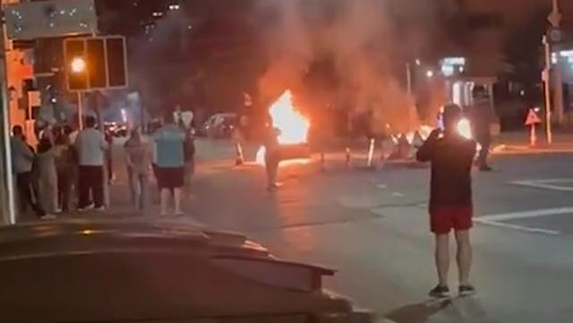 <p>Switzerland riots: Protesters fire fireworks at officers after teenager killed in police  chase.</p>