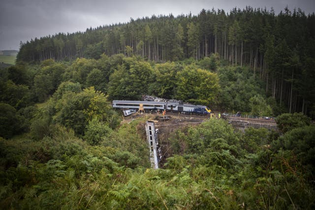 Three people were killed in the derailment in August 2020 (Jane Barlow/PA)