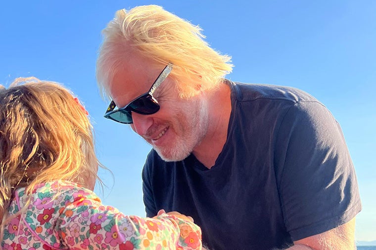 Boris Johnson has been depicted playing with his daughter during a holiday in Greece