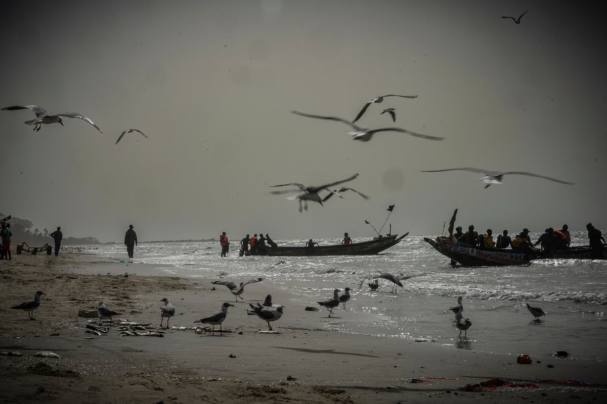 Photos of a Gambian village where a 'sea war' is brewing