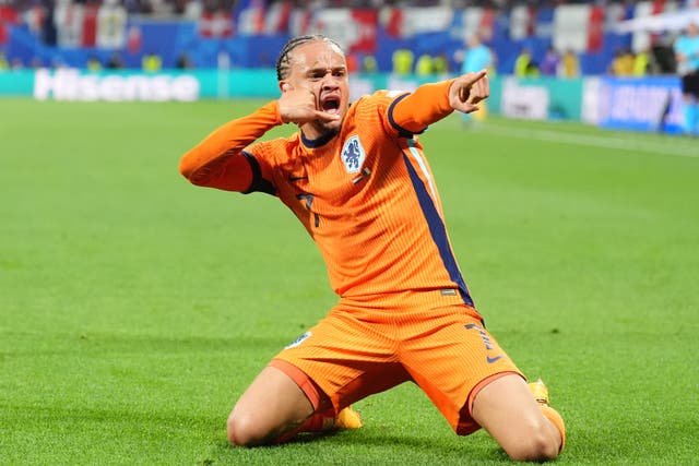 Xavi Simons celebrates for Netherlands at Euro 2024 (Adam Davy/PA)