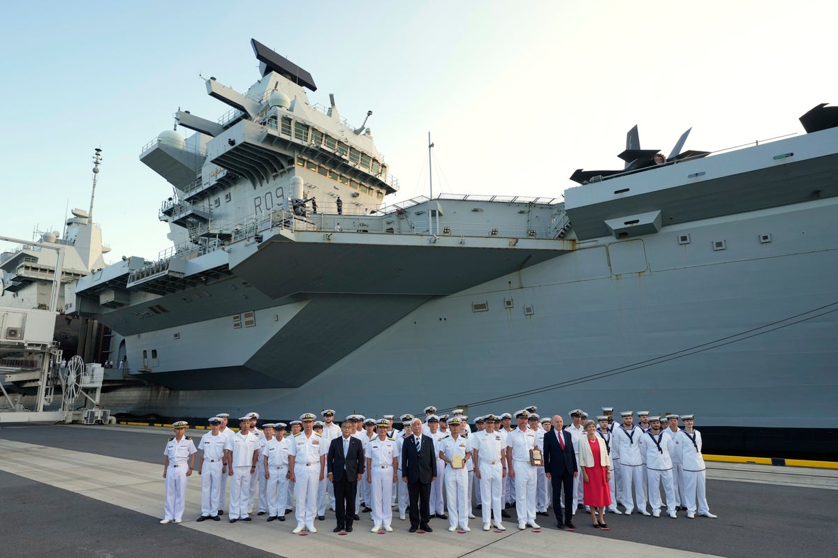 Japan says security ties with the UK at 'a new level' as aircraft carrier arrives in Tokyo