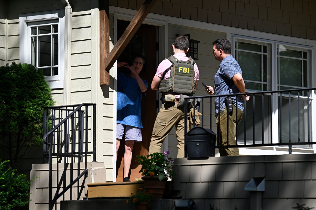 Neighbor watched cops take Minneapolis shooter’s family from their home as ‘surreal’ connection to killer set in