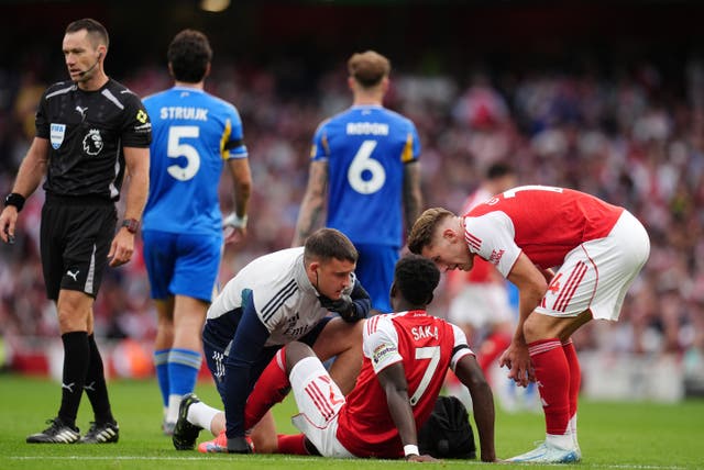 <p>Bukayo Saka was withdrawn in the win over Leeds with a hamstring injury (John Walton/PA)</p>