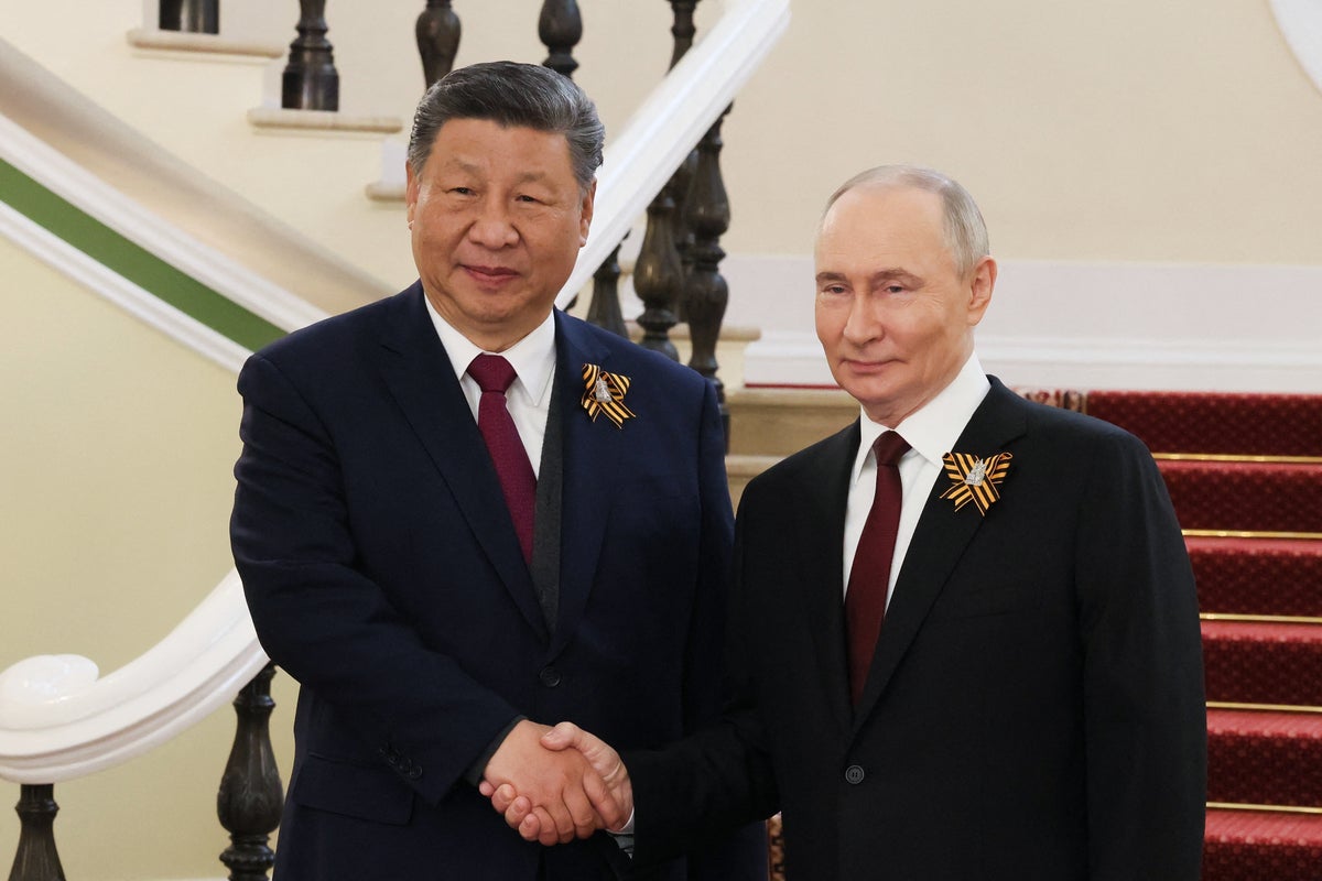 Kim Jong Un to join Xi and Putin at Beijing military parade in rare trip outside North Korea