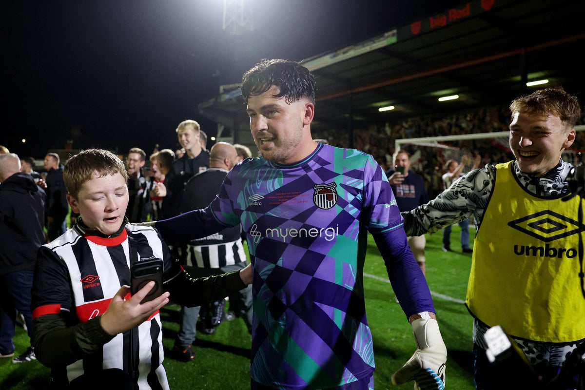 Grimsby goalkeeper and Man United fan admits he’s ‘half fuming’ after inflicting stunning upset