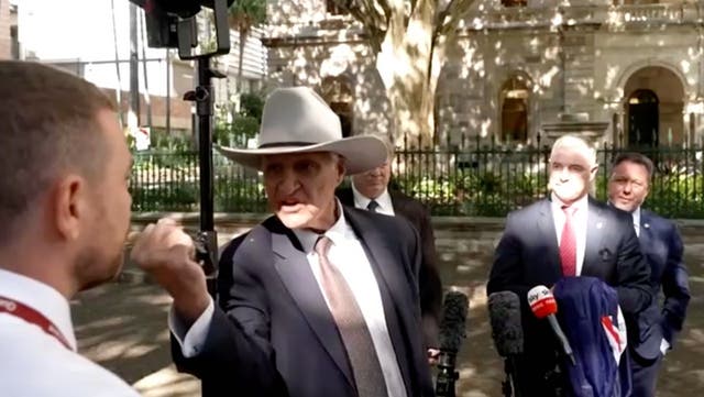 <p>Australian politician Bob Katter shakes his fist at a journalist in an angry outburst</p>