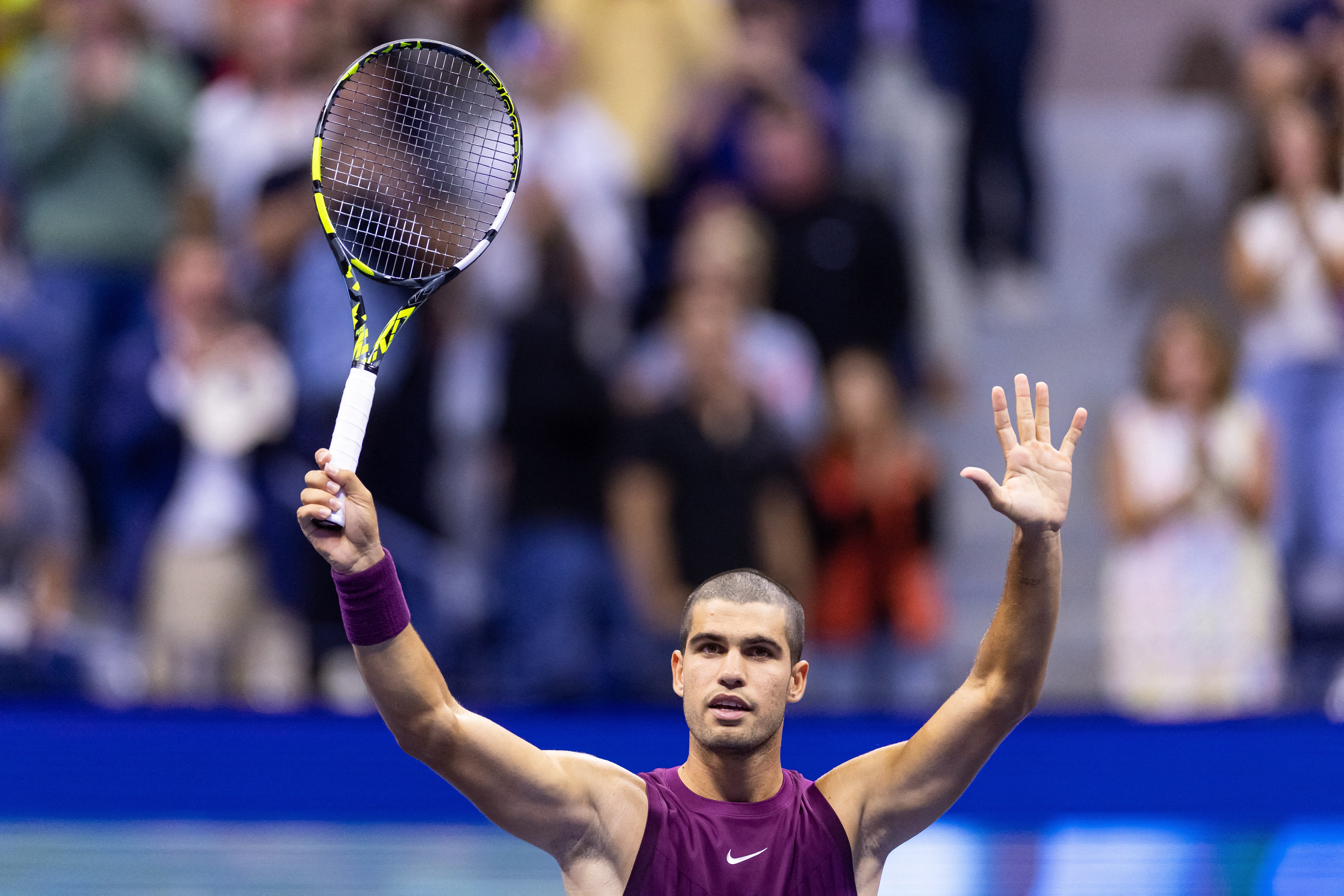 <p>Carlos Alcaraz powered into the third round of the US Open and repeated his golf swing celebration after a dominant 6-1 6-0 6-3 win over Italy's Mattia Bellucci</p>