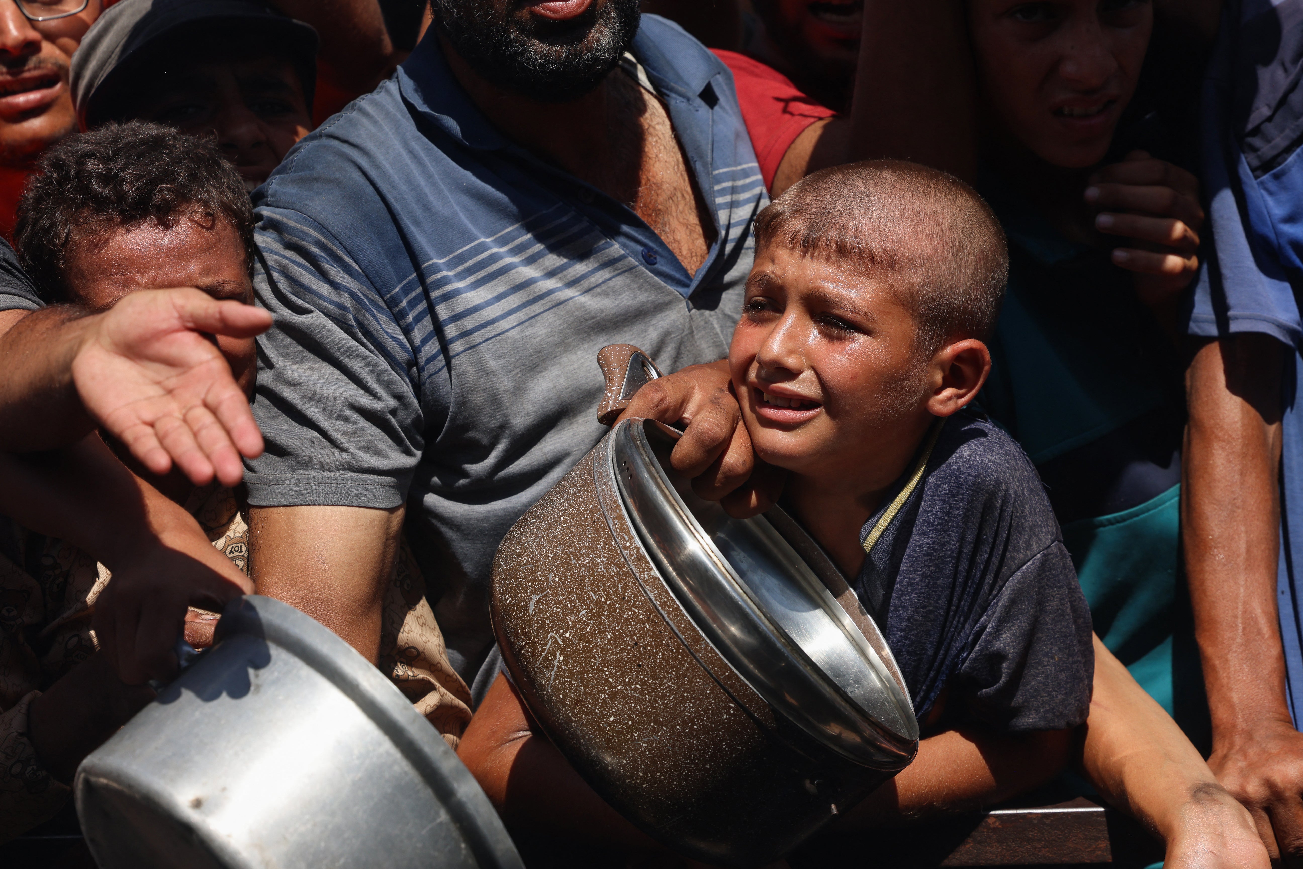 Palestinians waiting for aid in Khan Younis