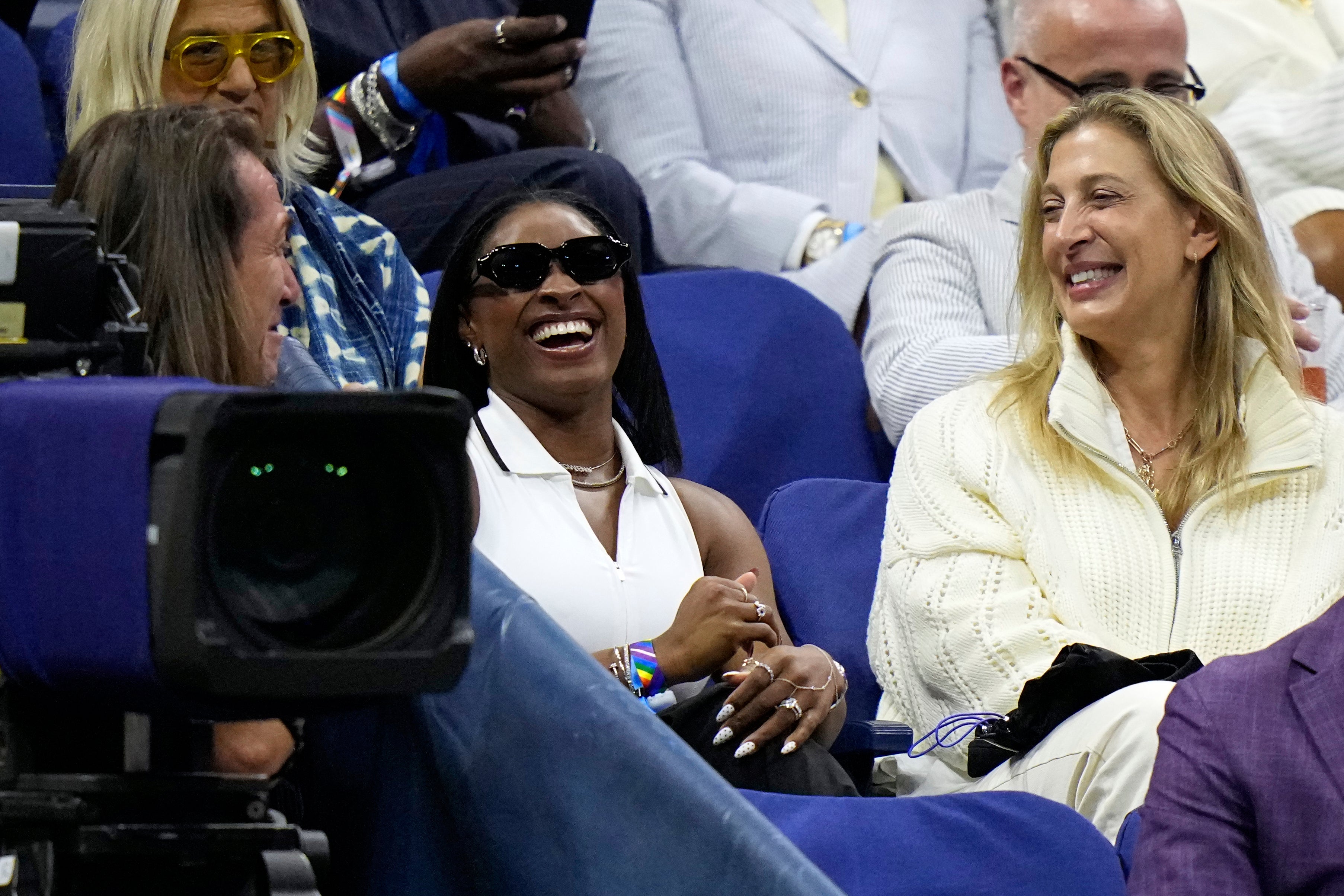 Simone Biles, centre, provided inspiration for Coco Gauff (Frank Franklin II/AP)