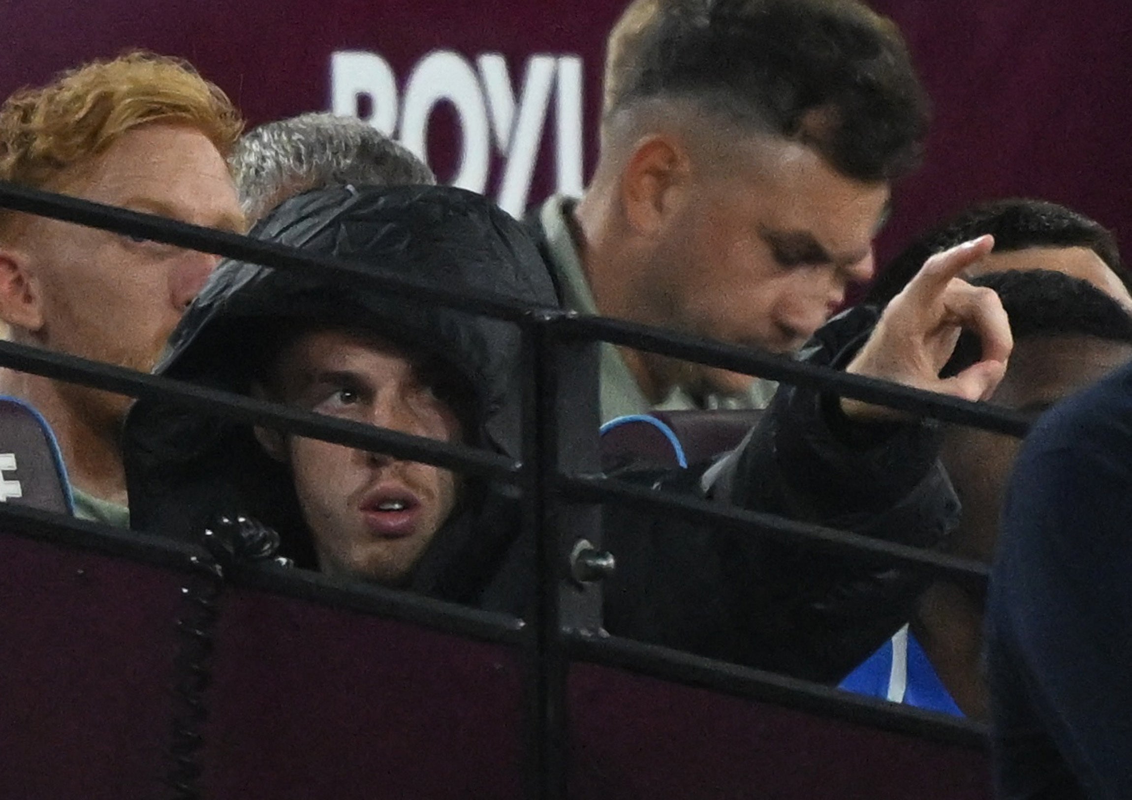 Chelsea's Cole Palmer sits on the bench after sustaining an injury