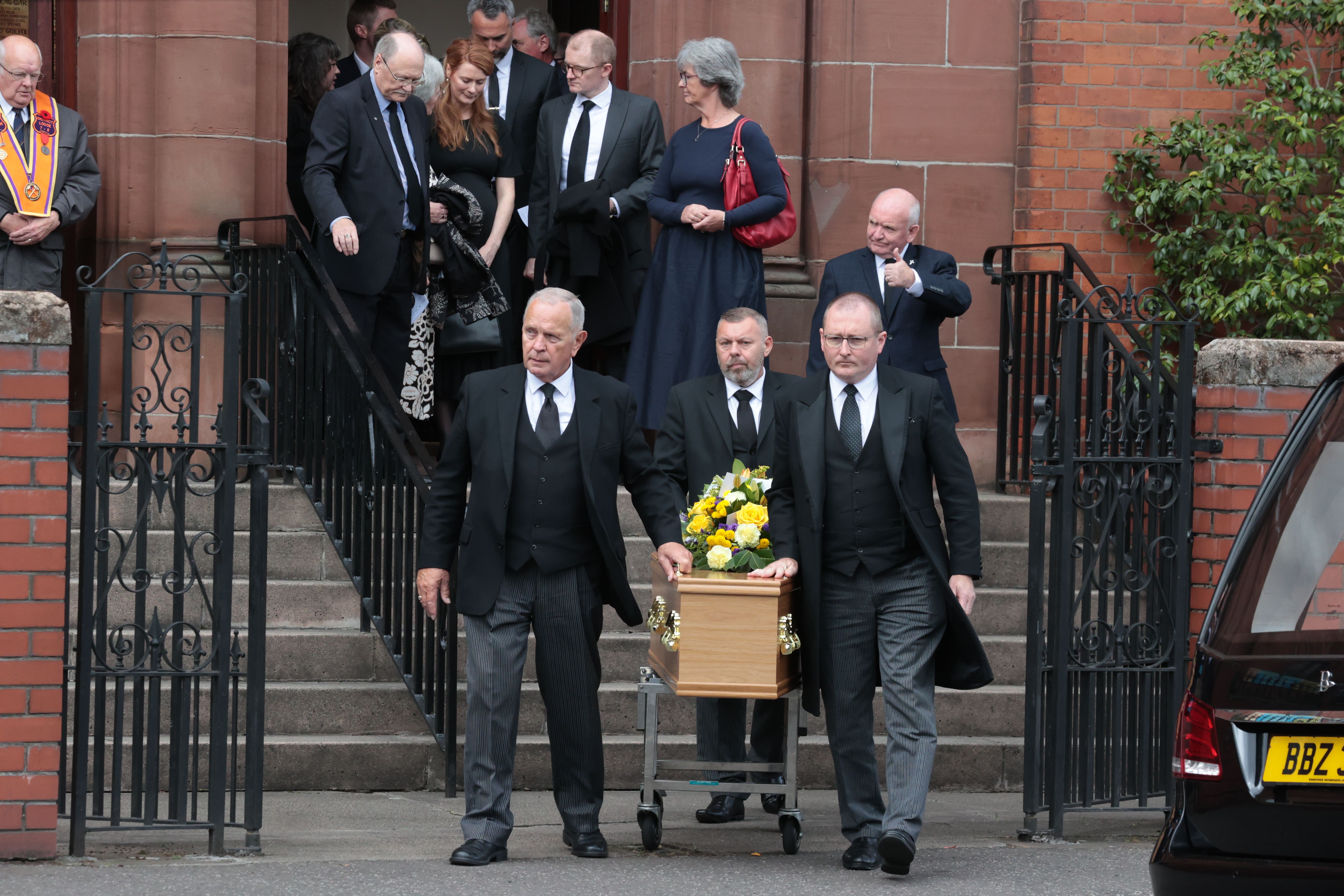 The coffin is taken from the church after a Service of Thanksgiving for the former Ulster Unionist Party MP Rev Martin Smyth (PA)