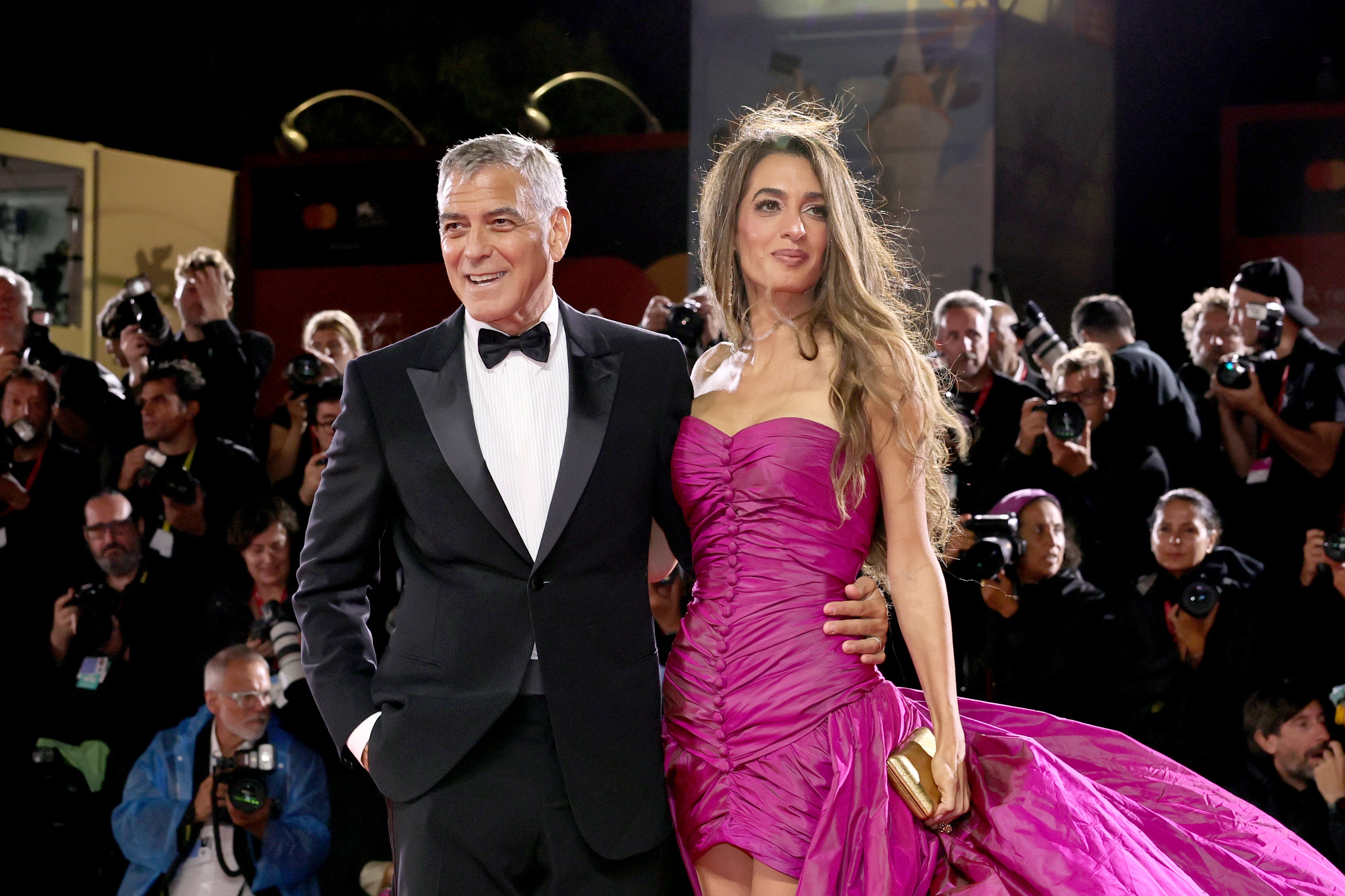 George Clooney and Amal Clooney at the 'Jay Kelly' red carpet during the 82nd Venice International Film Festival; The actor was forced to miss multiple press appearances earlier in the day due to a sinus infection