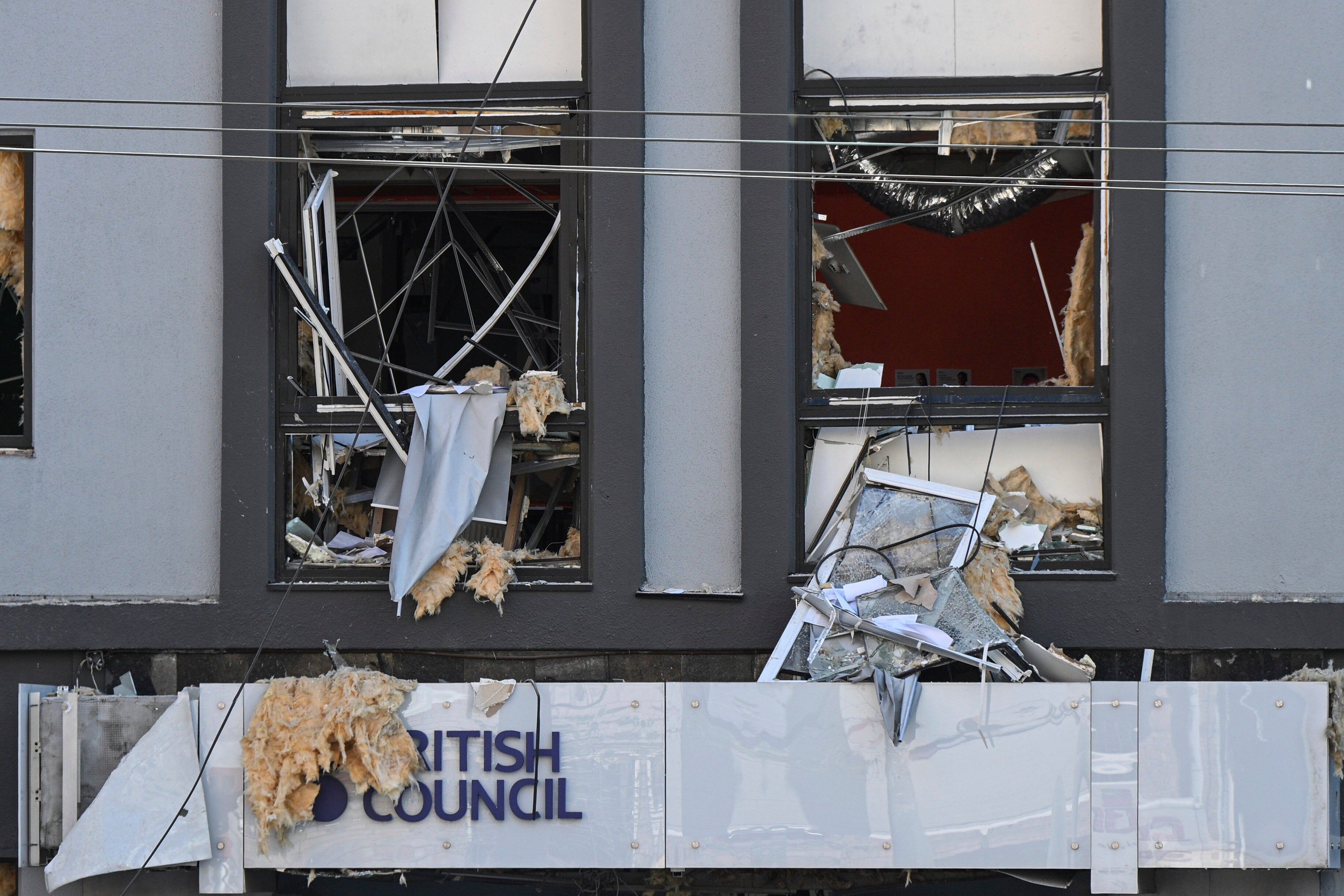 The damaged building of the British Council is seen following Russian missile and drone attacks in central Kyiv, Ukraine, Thursday, Aug. 28, 2025. (AP Photo/Danylo Antoniuk)