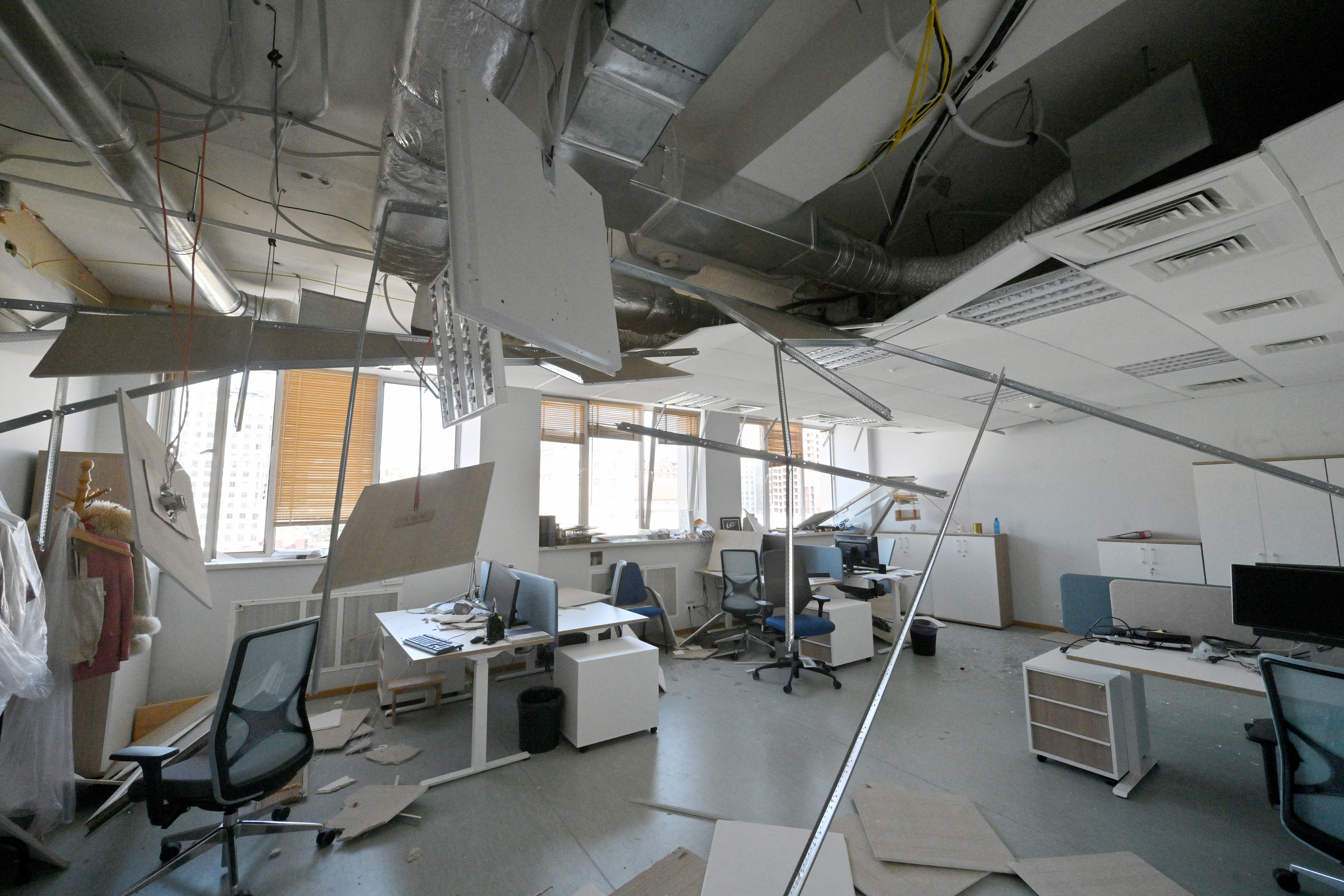 This picture shows damages in the offices of the European Union delegation in Ukraine after a Russian missile and drone attack on apartment blocks that killed at least 14 people, including three children, also hit the EU mission's building in the Ukrainian capital, in Kyiv on August 28, 2025. (Photo by Sergei SUPINSKY / AFP) (Photo by SERGEI SUPINSKY/AFP via Getty Images)