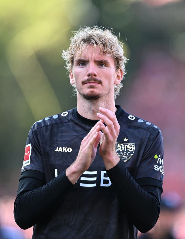 <p>Stuttgart's Nick Woltemade applauds fans</p>