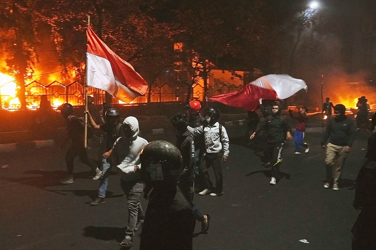 Protests in Indonesia turn violent as parliament building set alight