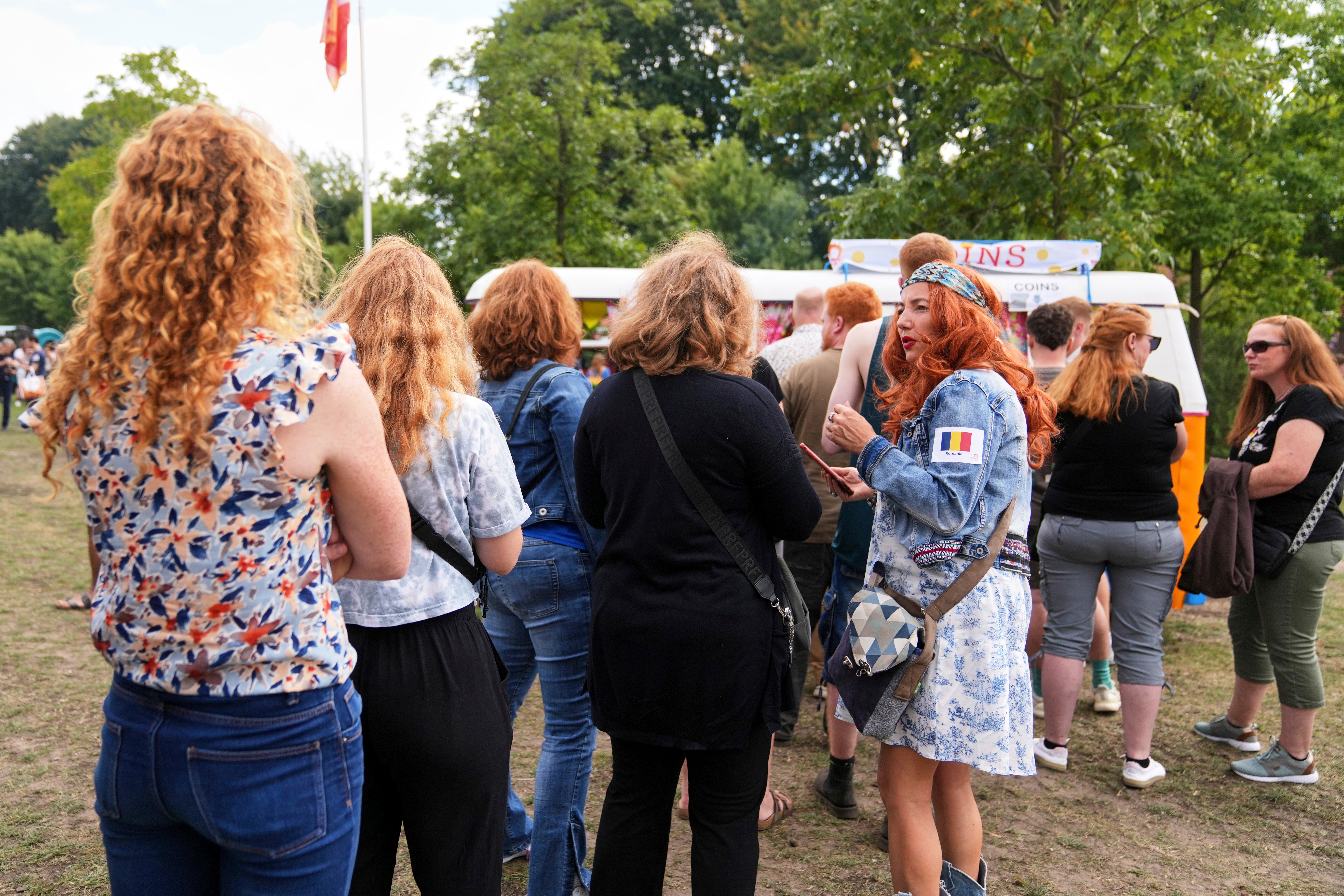 Participants wait in line for tickets at the Netherlands Redhead Festival