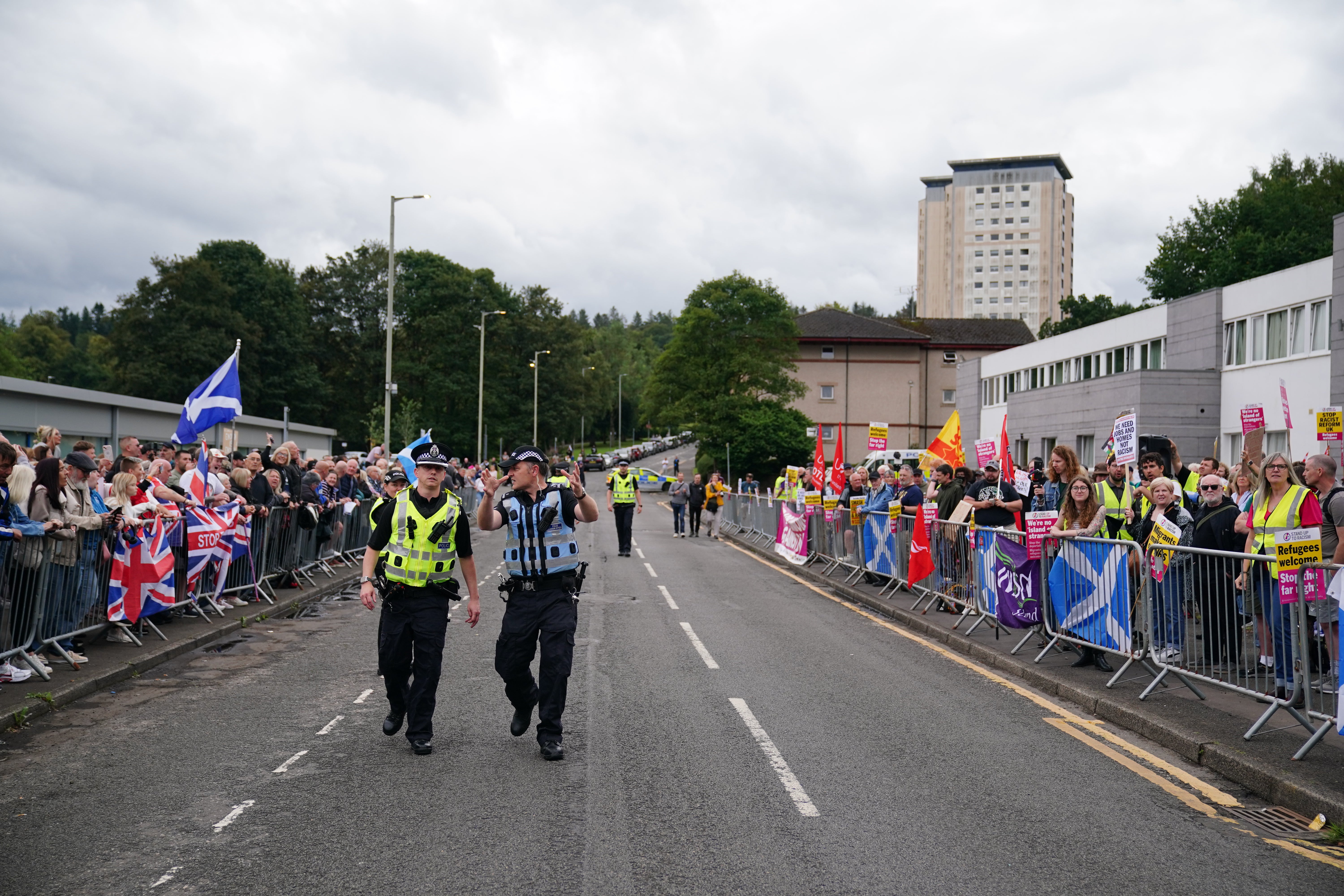 Save Under Future and Our Kids Futures Stand for the protesters and racism and face each other outside Cladhan Hotel in Falkirk (Jane Barlo/Pa)