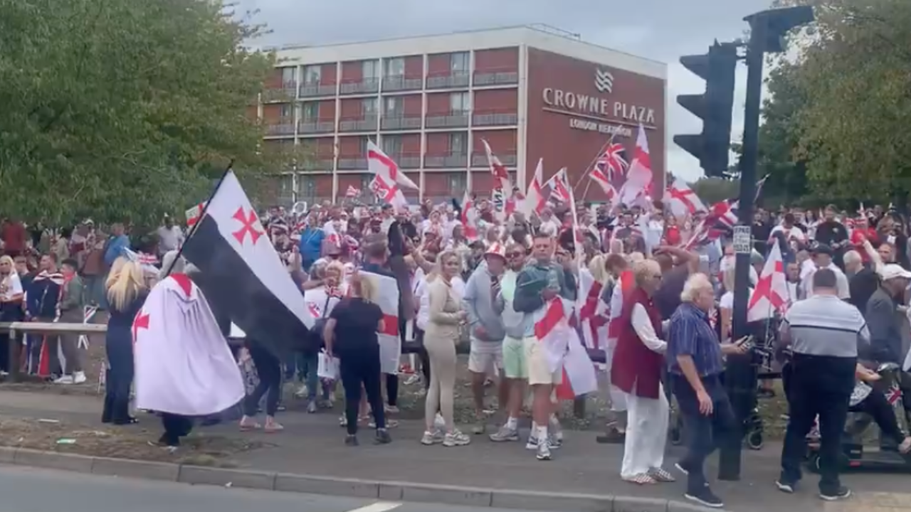 Protesters gather outside London asylum hotel where ‘masked men’ attempted to enter