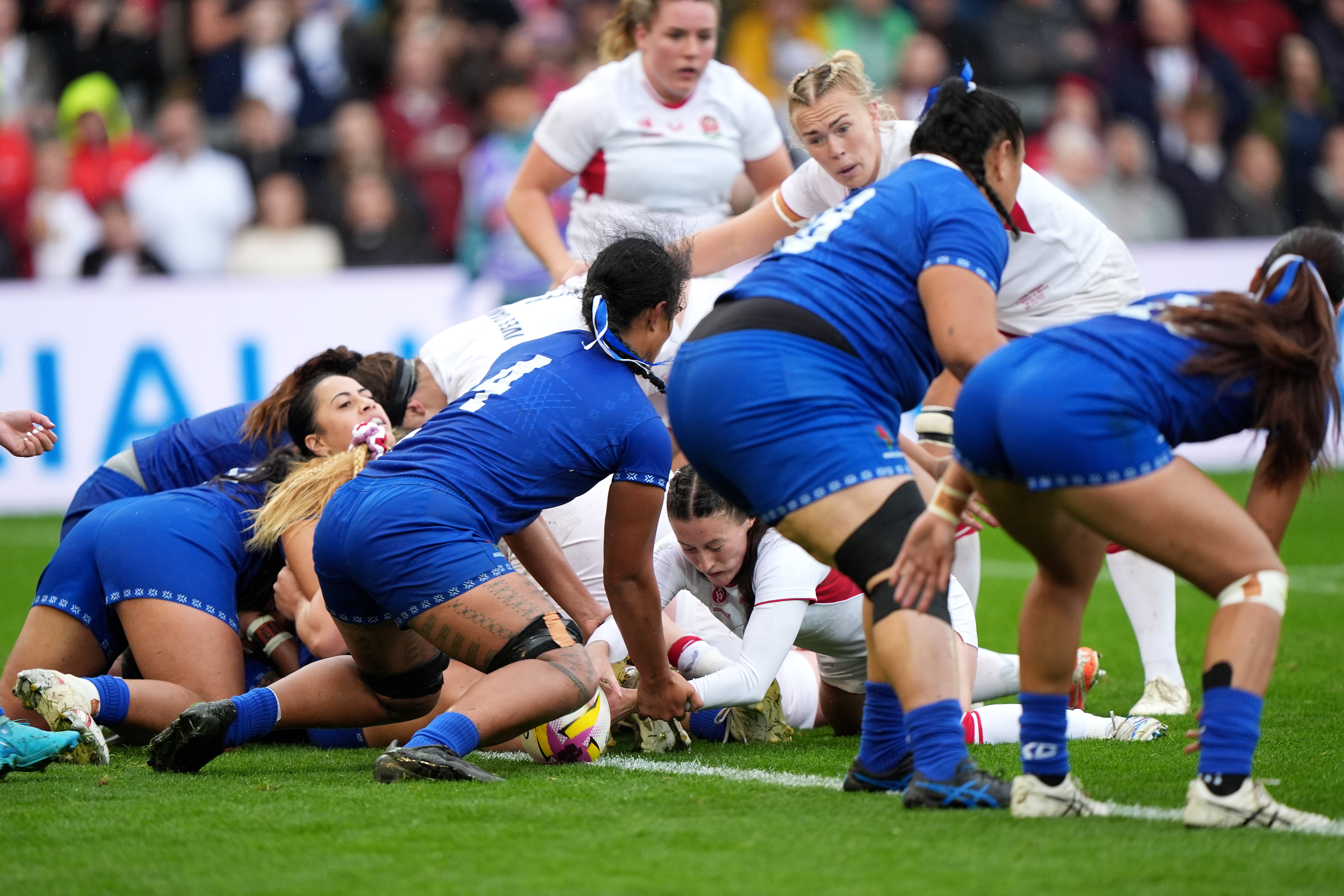 Lucy Packer forced her way over the line (Joe Giddens/PA)
